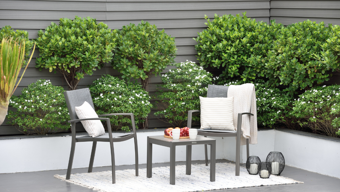 Two aluminium garden chairs.